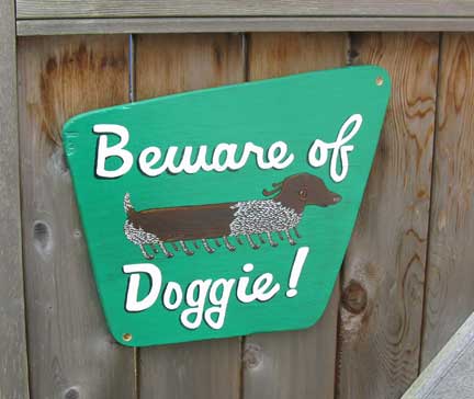 beware of doggie sign by Tripper Dungan
