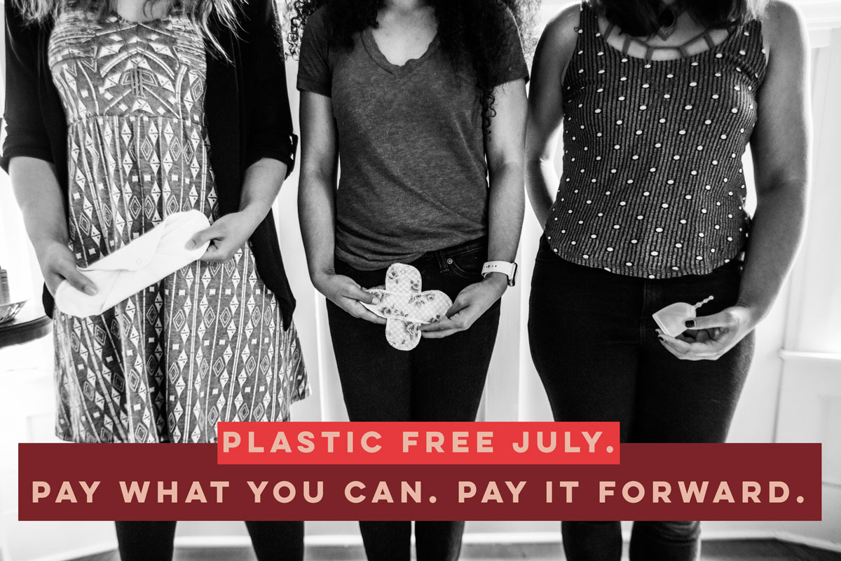 Three people hold various cloth pads and a menstrual cup in front of their bodies.